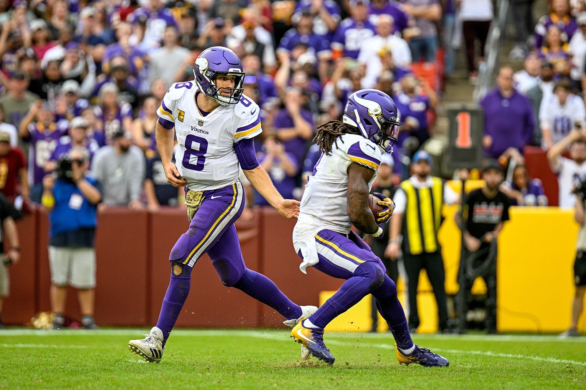 Minnesota Vikings quarterback, Kirk Cousins, hands the ball off to running back, Dalvin Cook, in a game against the Washington Commanders at FedEx Field, Landover, Maryland on November 6, 2022.