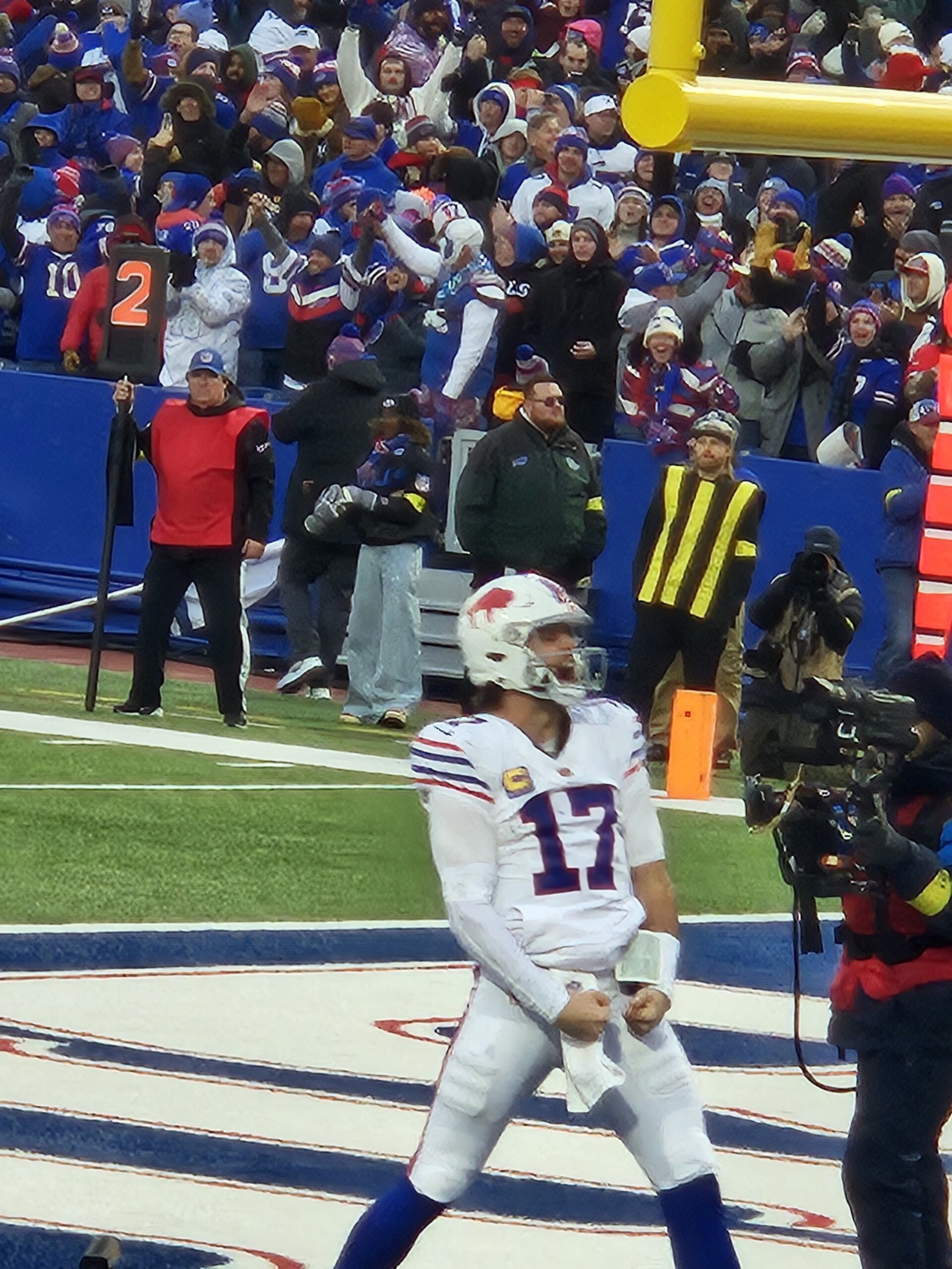Bills QB Josh Allen celebrates his sixth TD of the day as the CBS cameraman videotapes
